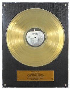John Lennon Apple Records In-House Gold Record Award for “Mind Games” Presented to John Lennon
