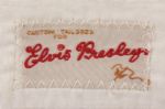 Elvis Presley Owned and Worn Custom Made White Corduroy Jacket With Red Faux Fur Collar and Matching Pants