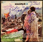 Woodstock 1969 Album Cover Signed by 12
