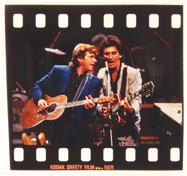 George Harrison & Carl Perkins Original Negatives Sold With Copyright