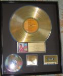 Elvis Presley ”Blue Hawaii" Original RIAA Gold Album, Cassette and CD Award Presented to Elvis Presley