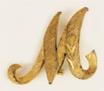 Michael Jackson Owned and Worn Gold "M" Pin