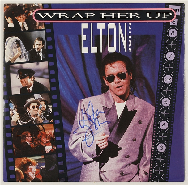 Elton John Signed "Wrap Her Up" Album