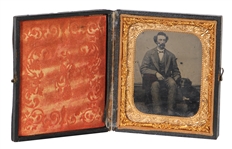 Seated Mustached Man and Dog Encased Tintype