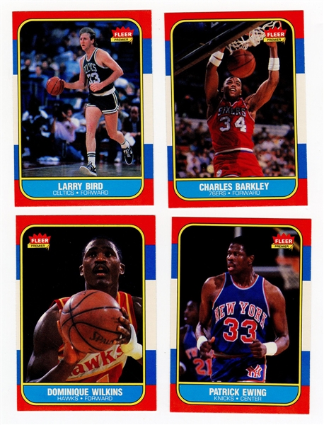 Lot of 4 1986 Fleer Basketball Cards - Larry Bird, Charles Barkley, Patrick Ewing, and Dominique Wilkins