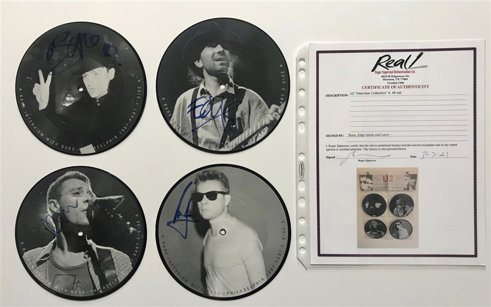 U2 Autographed Set of 4 45 RPMs REAL
