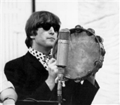 George Harrison Owned and Played Tambourine