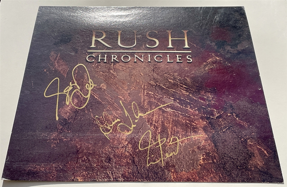 Rush Band Signed “Chronicles” 22 x 24 Promotional Flat (JSA & REAL)