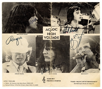 AC/DC Band Signed Incredibly Rare “High Voltage” Photograph Advertisement (REAL)